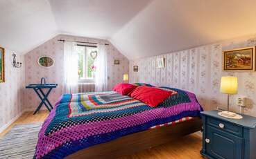Zweites Schlafzimmer mit Doppelbett Ferienhaus Drängstugan