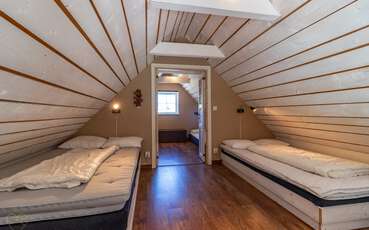 Schlafloft mit zwei Einzelbetten Ferienhaus Drottningskär