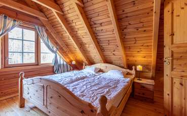 Schlafzimmer mit Doppelbett Ferienhaus Gotland