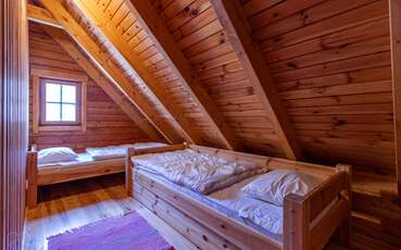 Schlafzimmer mit zwei Einzelbetten Ferienhaus Gotland