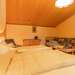 Schlafzimmer mit Doppelbett und Einzelbett Ferienhaus Lindåsen