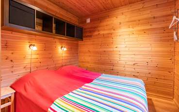 Schlafzimmer mit Doppelbett Ferienhaus Örsjön