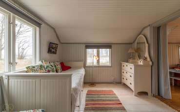 Schlafbereich mit ausziehbaren Doppelbett Ferienhaus Ragnabo