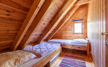 Zweites Schlafzimmer mit zwei Einzelbetten Ferienhaus Saltkråkan