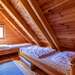 Erstes Schlafzimmer mit zwei Einzelbetten Ferienhaus Saltkråkan