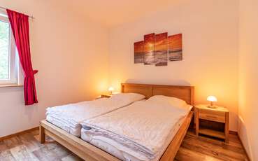 Schlafzimmer mit Doppelbett Ferienhaus Vimmerby