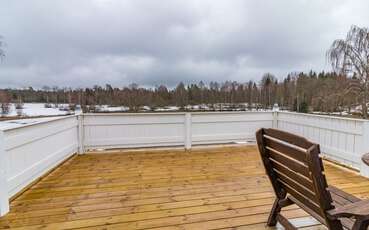 Balkon mit Seeblick Ferienhaus Am Fegen