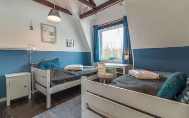 Schlafzimmer oben zwei Einzelbetten Ferienhaus Am Fegen