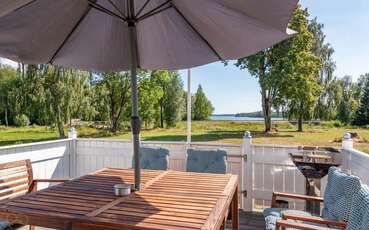 Terrasse mit Seeblick Ferienhaus Am Fegen