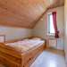 Erstes Schlafzimmer mit Ausziehbett Ferienhaus Annelund