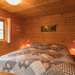 Schlafzimmer mit Doppelbett Ferienhaus Björkholmen