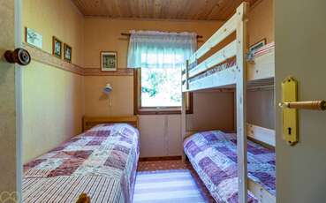 Schlafzimmer mit zwei Einzelbetten Ferienhaus Björksjön