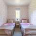 Schlafzimmer mit zwei Einzelbetten Ferienhaus Björktorpet
