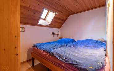 Schlafzimmer mit Doppelbett Ferienhaus Björnstigen