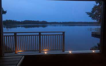 Blick aus Sauna Dämmerung Ferienhaus Bolmen