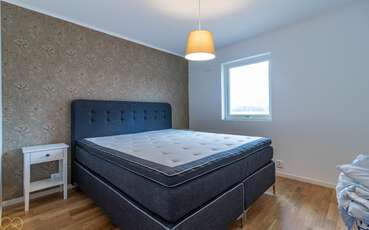 Schlafzimmer mit Doppelbett Ferienhaus Bolmenstuga