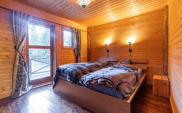 Schlafzimmer mit Doppelbett Ferienhaus Foxen