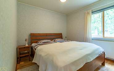 Schlafzimmer mit Doppelbett Ferienhaus Granlunden