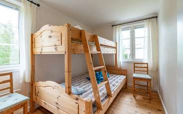 Schlafzimmer mit Etagenbett Außenhaus Ferienhaus Grimmered