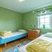 Schlafzimmer mit zwei Einzelbetten Ferienhaus Gröna Stugan