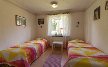 Schlafzimmer mit zwei Einzelbetten Ferienhaus Hjorten