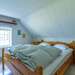 Schlafzimmer mit Doppelbett Ferienhaus Hökamåla