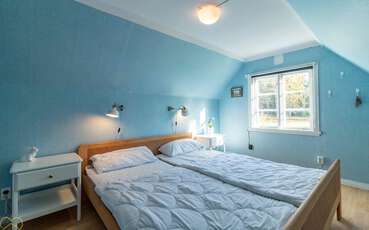 Schlafzimmer mit Doppelbett Ferienhaus Idas stuga