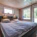 Erstes Schlafzimmer mit Doppelbett Ferienhaus Istaby