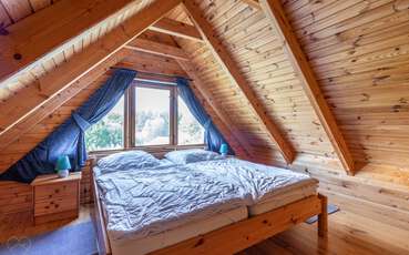Schlafzimmer mit Doppelbett Ferienhaus Katthult