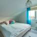 Schlafzimmer mit Doppelbett Ferienhaus Kolstigen