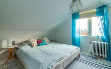 Schlafzimmer mit Doppelbett Ferienhaus Kolstigen