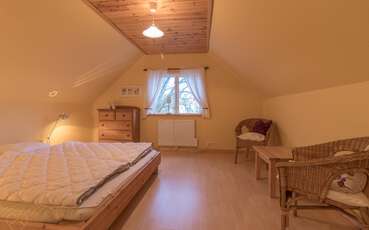 Schlafzimmer mit Doppelbett Ferienhaus Lessebo