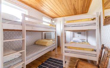 Schlafzimmer mit zwei Etagenbetten Ferienhaus Lilla Gård