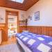 Schlafzimmer mit Einzelbett Ferienhaus Lillebo