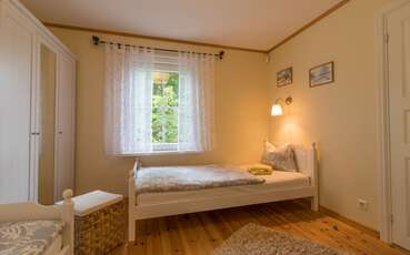Schlafzimmer mit zwei Einzelbetten Ferienhaus Lillesjö