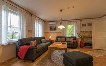 Wohnbereich mit gemütlichen Sofas Ferienhaus Lillesjö