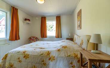 Erstes Schlafzimmer mit Doppelbett Ferienhaus Mio