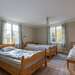 Schlafzimmer mit drei Einzelbetten Ferienhaus Nedre Gården