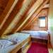 Schlafzimmer mit zwei Einzelbetten Ferienhaus Norrland