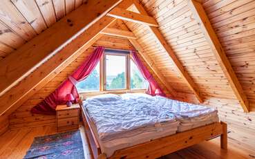 Schlafzimmer mit Doppelbett Ferienhaus Norrland