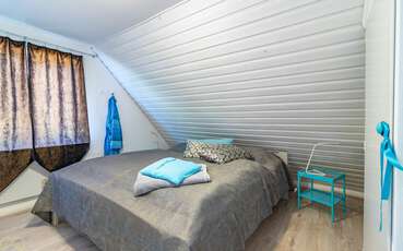 Schlafzimmer mit Doppelbett Ferienhaus Nyadal