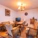 Wohnzimmer mit TV Ferienhaus Quade