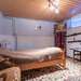 Schlafzimmer mit Einzelbett Ferienhaus Quade