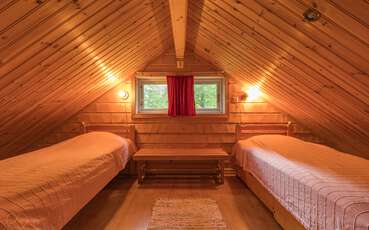 Schlafloft mit zwei Einzelbetten Ferienhaus Räven