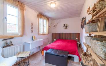Schlafzimmer mit einem Einzelbett Ferienhaus Revesjö