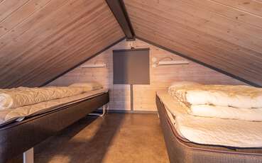 Schlafloft mit zwei Einzelbetten Ferienhaus Rödjuret
