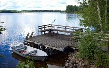 Boot am Steg Ferienhaus Seeblick