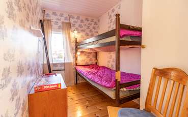 Schlafzimmer mit Etagenbett Ferienhaus Seeblick