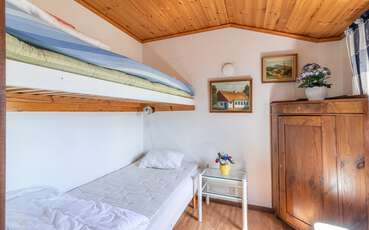 Schlafzimmer mit Etagenbett Ferienhaus Skummeslöv