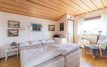 Schlafzimmer mit zwei Einzelbetten Ferienhaus Skummeslöv